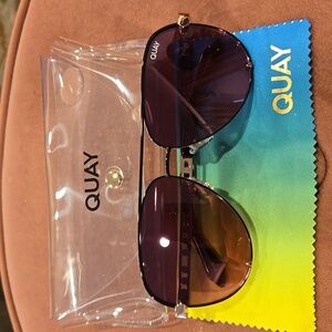 New Quay sunglasses in case.